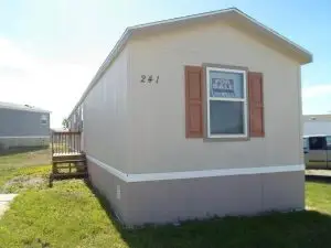 Mobile home exterior with private steps at Cottonwood Mobile Home Park in Wright Wyoming